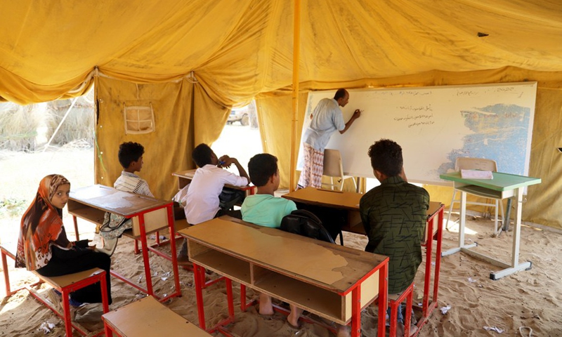 Students study inside a tent classroom in Hajjah province, northern Yemen, on Oct. 23, 2022.(Photo: Xinhua)