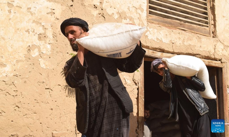 Afghan farmers receive improved seed and fertilizer in Jawzjan province, Afghanistan, Oct. 26, 2022. Afghan provincial administration distributed improved seed and fertilizer to nearly 16,000 farmers in Afghanistan's northern Jawzjan province on Wednesday, provincial head for Agriculture, Irrigation and Livestock Qari Abadullah Ansar said.(Photo: Xinhua)