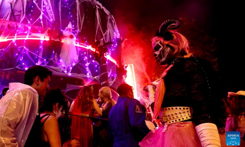 People gather to celebrate the Halloween in West Hollywood, Los Angeles, California, the United States on Oct. 31, 2022.(Photo: Xinhua)