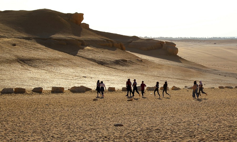 Tourists visit a desert in Fayoum, Egypt on Oct. 29, 2022.(Photo: Xinhua)