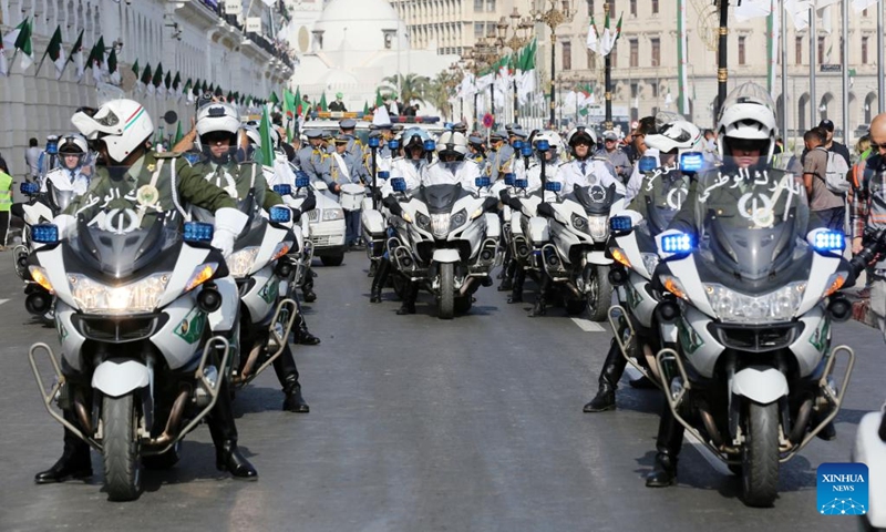 People take part in a parade to celebrate the National Day in Algiers, Algeria, Oct. 31, 2022.(Photo: Xinhua)