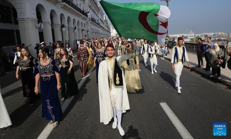 People take part in a parade to celebrate the National Day in Algiers, Algeria, Oct. 31, 2022.(Photo: Xinhua)