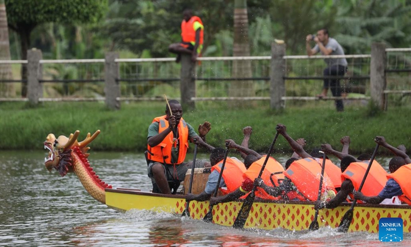 A drummer plays drum during a dragon boat race at the Forest Park Buloba, Wakiso District, Uganda, Oct. 30, 2022.(Photo: Xinhua)