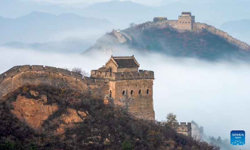 This photo taken on Oct. 31, 2022 shows the Jinshanling section of the Great Wall amid clouds in Luanping County, north China's Hebei Province.(Photo: Xinhua)