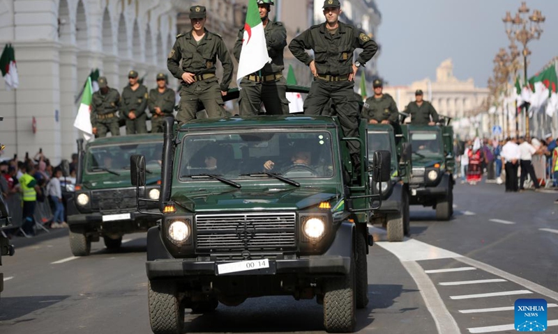 People take part in a parade to celebrate the National Day in Algiers, Algeria, Oct. 31, 2022.(Photo: Xinhua)