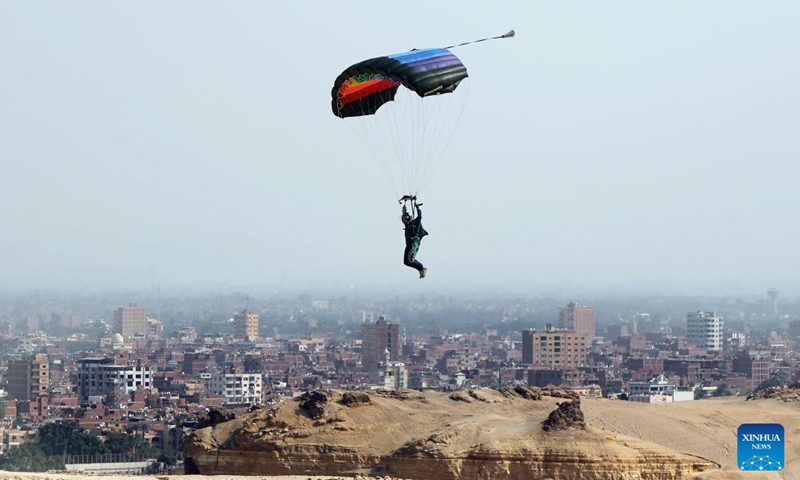 A skydiver flies during the skydiving festival Jump Like a Pharaoh in Giza, Egypt, on Nov. 2, 2022.(Photo: Xinhua)