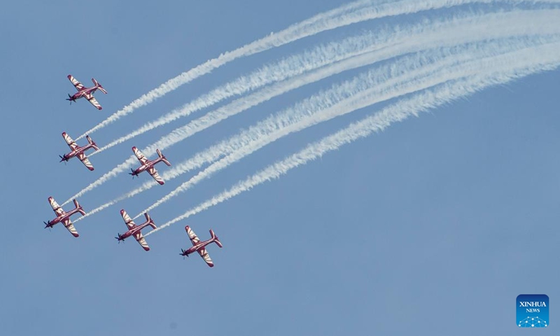 Airplanes from the Qatar Amiri Air Force aerobatic display team perform in Doha, Qatar, Nov. 5, 2022. (Photo by Nikku/Xinhua)