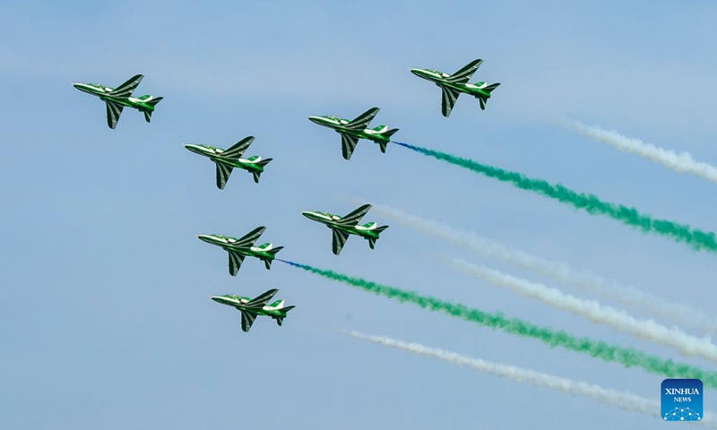 Airplanes from the Saudi Hawks aerobatic display team perform in Doha, Qatar, Nov. 5, 2022. (Photo by Nikku/Xinhua)