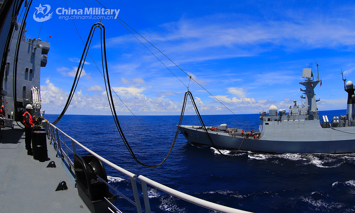 Vessels attached to a naval combat support flotilla under the PLA Southern Theater Command conduct replenishment-at-sea during a maritime real combat training exercise at the end of September 2022, to hone their combat support capabilities. (eng.chinamil.com.cn/Photo by Li Junlin)