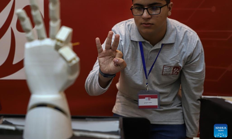 A Palestinian student participates in a digital exhibition with his digital project in Gaza City, on Nov. 7, 2022.(Photo: Xinhua)