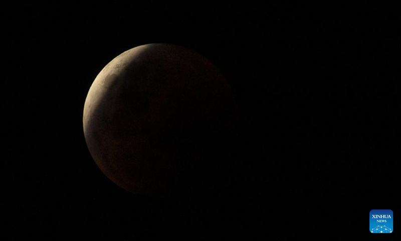 The moon is seen during a total lunar eclipse in Sydney, Australia, Nov. 8, 2022.(Photo: Xinhua)