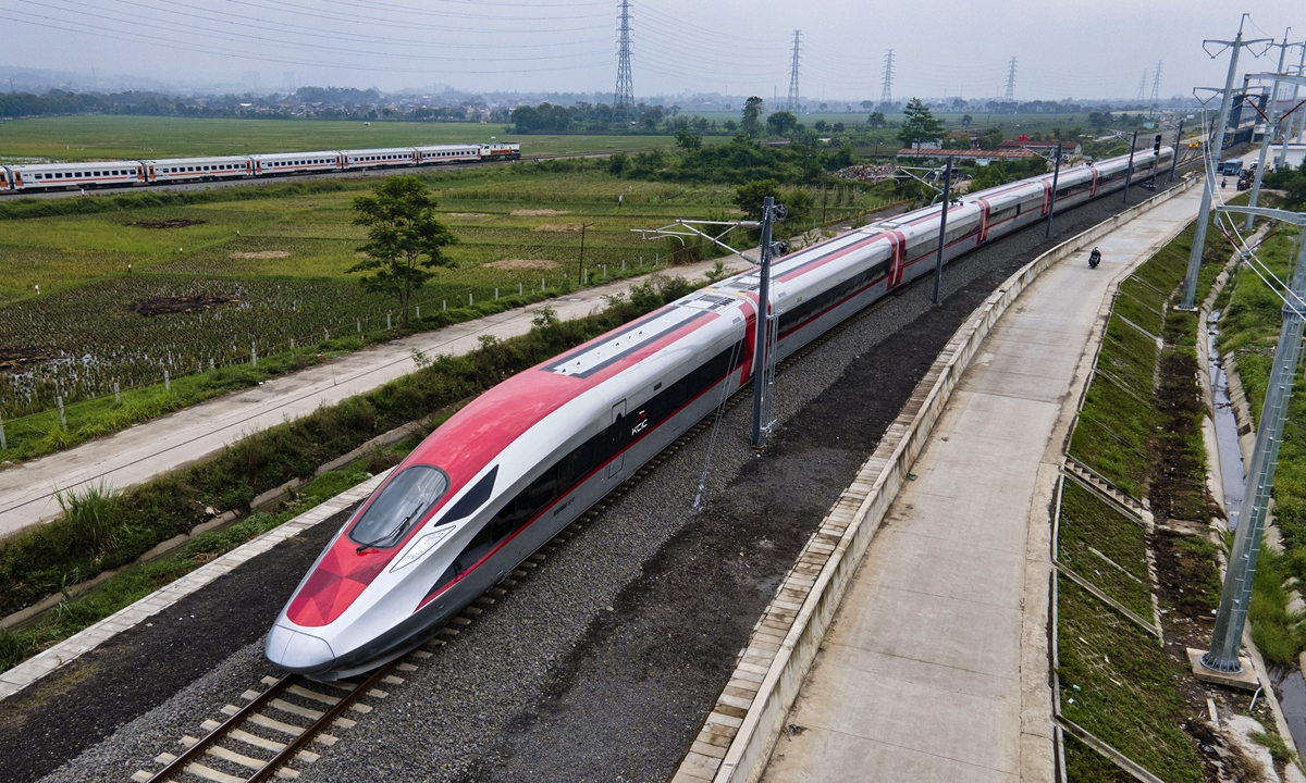 A China-made high-speed train makes a trial run along a 14-kilometer testing section of the Jakarta-Bandung High-Speed Railway in Bandung, Indonesia, on November 9, 2022. The trial on electricity supply was conducted that day as the railway, a landmark project under the Belt and Road Initiative, is approaching completion (See story on Page 9). Photo: VCG