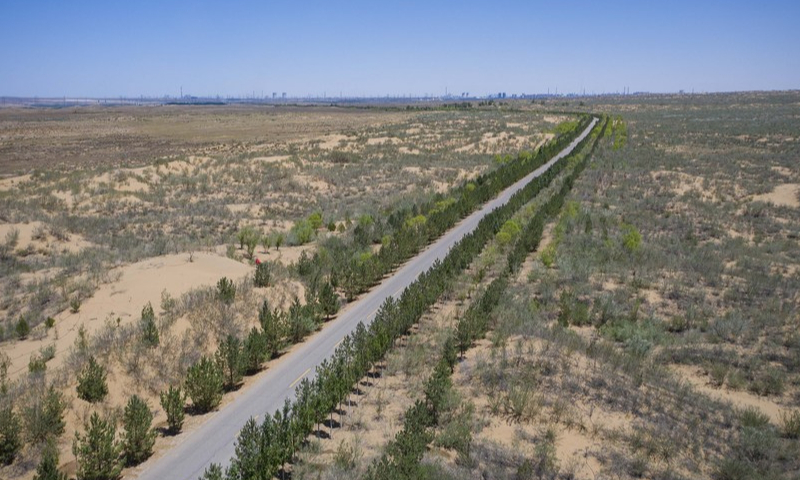 This aerial photo taken on June 14, 2022 shows a view of Baijitan national ecological reserve of Lingwu, northwest China's Ningxia Hui Autonomous Region. (Xinhua/Yang Zhisen)