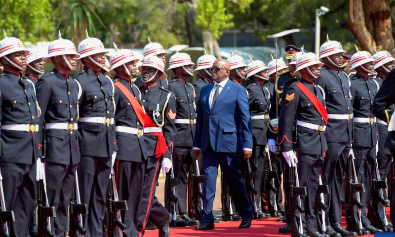 Botswanan President Mokgweetsi Masisi inspects the guard of honor in Gaborone, Botswana, Nov. 14, 2022. Masisi said Monday that sustainable use of natural resources and mitigation of the harmful effects of climate change were critical for the country's sustainable development. Photo: Xinhua