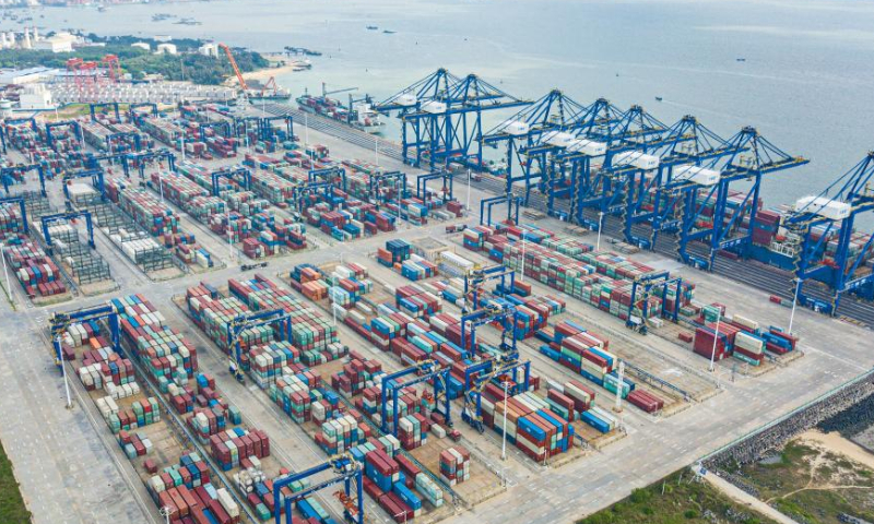 This aerial photo taken on Dec. 10, 2022 shows a view of the Yangpu international container terminal in the Yangpu Economic Development Zone, south China's Hainan Province. According to Haikou Customs statistics, in the first 11 months of 2022, the total import and export value of Hainan's goods trade was 182.63 billion yuan (about 26.25 billion U.S. dollars), an increase of 40.1% year-on-year. (Xinhua/Pu Xiaoxu)