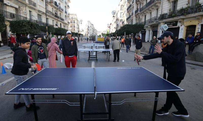 People take part in a car-free day event on a street in Algiers, Algeria, on Dec. 30, 2022. The car-free day event was held in downtown Algiers on Friday to raise public awareness about environment. Photo: Xinhua