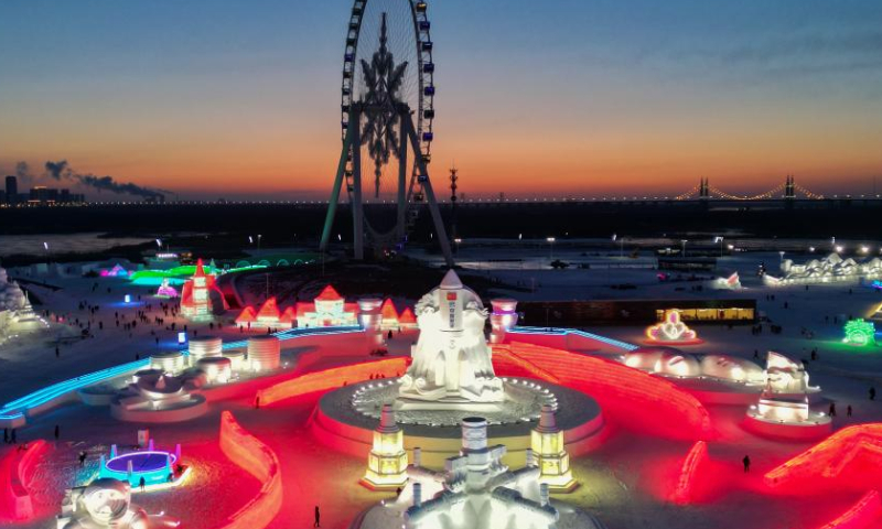 This aerial photo taken on Dec. 17, 2022 shows a view of the Harbin Ice-Snow World, a renowned seasonal theme park, in Harbin, northeast China's Heilongjiang Province. The theme park underwent a test run on Saturday in Harbin. (Xinhua/Zhang Tao)