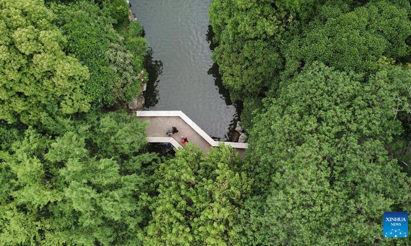 This aerial photo taken on May 5, 2021 shows citizens walking at Huancheng park in Hefei City, east China's Anhui Province.

Hefei has five national wetland parks and three provincial wetland parks, with a wetland protection rate of 75 percent.

It was accredited on Nov. 10, 2022 by the Ramsar Convention as an international wetland city. (Xinhua/Zhang Duan)