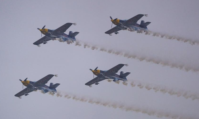 Aircraft from a South African aerobatic team perform at the Nanchang Air Show in Nanchang, east China's Jiangxi Province, Nov. 25, 2022. The 2022 China Aviation Industry Conference and Nanchang Air Show kicked off here on Friday. (Xinhua/Zhou Mi)