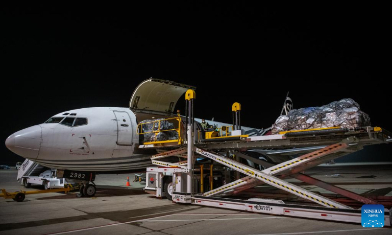 This photo taken on Nov. 27, 2022 shows an all-cargo aircraft bound for Shenzhen being loaded at the Ezhou Huahu Airport in Ezhou, central China's Hubei Province. (Xinhua/Wu Zhizun)