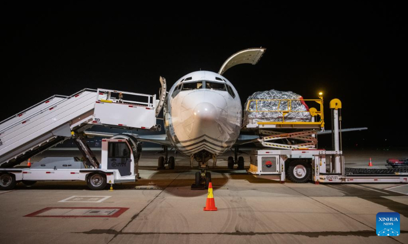 This photo taken on Nov. 27, 2022 shows an all-cargo aircraft from Shenzhen being unloaded at the Ezhou Huahu Airport in Ezhou, central China's Hubei Province. (Xinhua/Wu Zhizun)