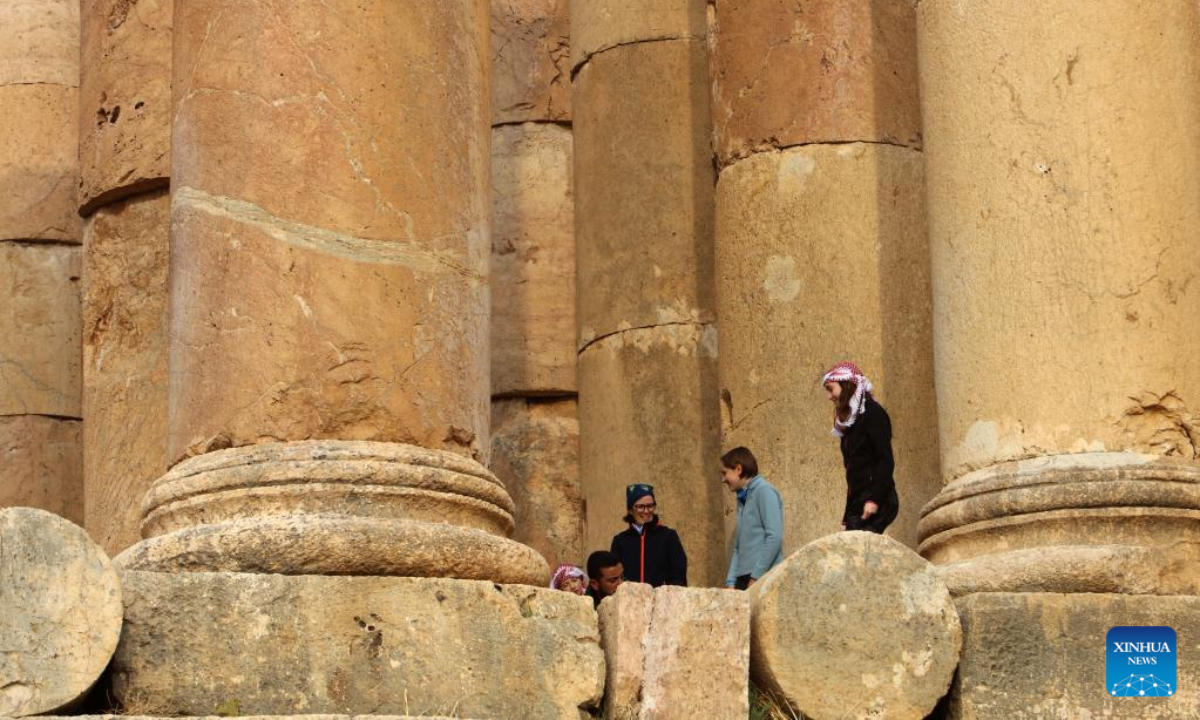 Tourists visit a Roman archeological site in Jerash, Jordan, on Dec 23, 2022. Photo:Xinhua