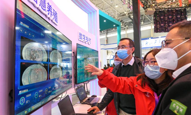 Visitors learn about a smart agricultural breeding platform at the 10th China (Mianyang) Science and Technology City International High-Tech Expo in Mianyang, southwest China's Sichuan Province, Nov. 16, 2022. Photo: Xinhua