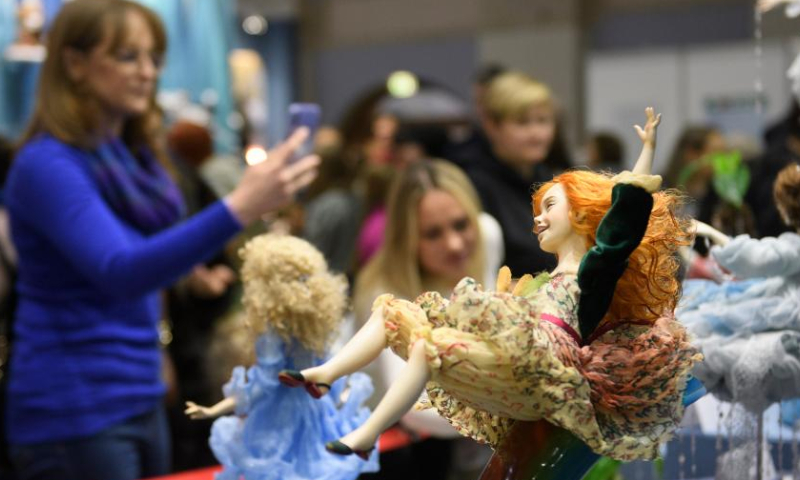 Dolls are on display during a doll exhibition in Moscow, Russia, Dec. 10, 2022. (Photo by Alexander Zemlianichenko Jr/Xinhua)