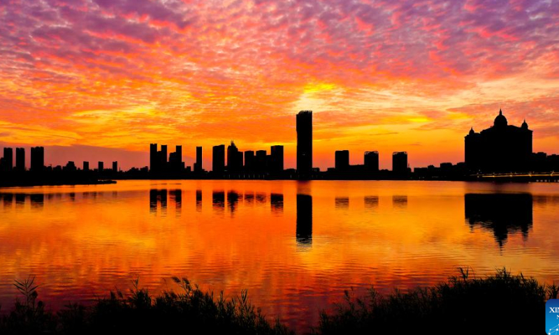 This aerial photo taken on Sept. 1, 2021 shows sunset scenery at the Yuelai Lake in Dongying, east China's Shandong Province. Dongying was certified as an international wetland city in 2018. Photo: Xinhua