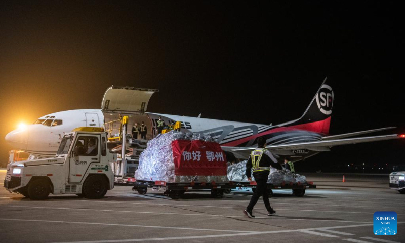 This photo taken on Nov. 27, 2022 shows an all-cargo aircraft from Shenzhen being unloaded at the Ezhou Huahu Airport in Ezhou, central China's Hubei Province. (Xinhua/Wu Zhizun)