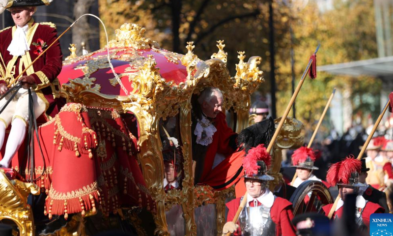 Alderman Nicholas Lyons, 694th Lord Mayor of the City of London, waves to crowds during the Lord Mayor's Show in London, Britain, on Nov. 12, 2022. The annual Lord Mayor's Show was held Saturday in the City of London. Originating from the tradition that each year a new lord mayor is elected to represent the traditional business center of London and must travel from the City to Westminster to swear loyalty to the king or queen, the show has now become a carnival for residents. Photo: Xinhua