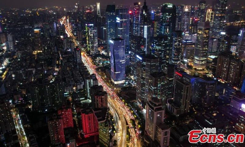 Drone photo shows aerial night view of a road with car lights in Guangzhou, south China's Guangdong Province, Dec. 1, 2022. (Photo: China News Service/Chen Jimin)