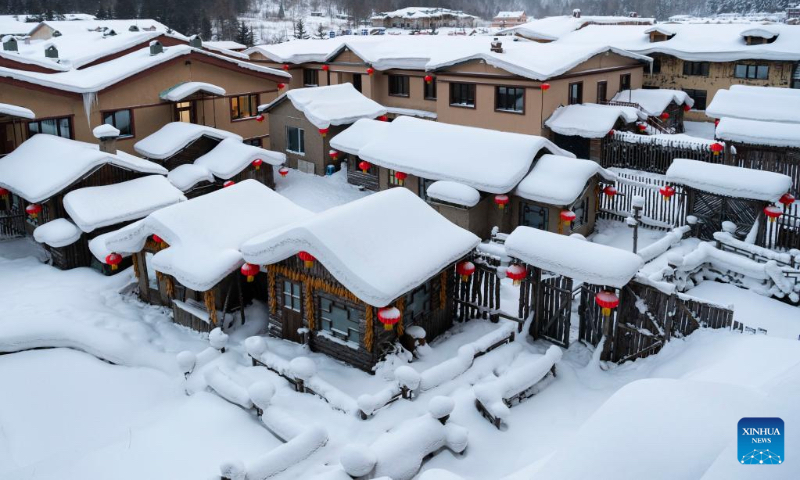 This photo taken on Dec. 14, 2022 shows a view of the Snow Town scenic spot in Hailin City in northeast China's Heilongjiang Province. The Snow Town scenic spot officially opened recently. Enjoying a seven-month snow season, it has become an attraction for tourists for years. (Xinhua/Xie Jianfei)