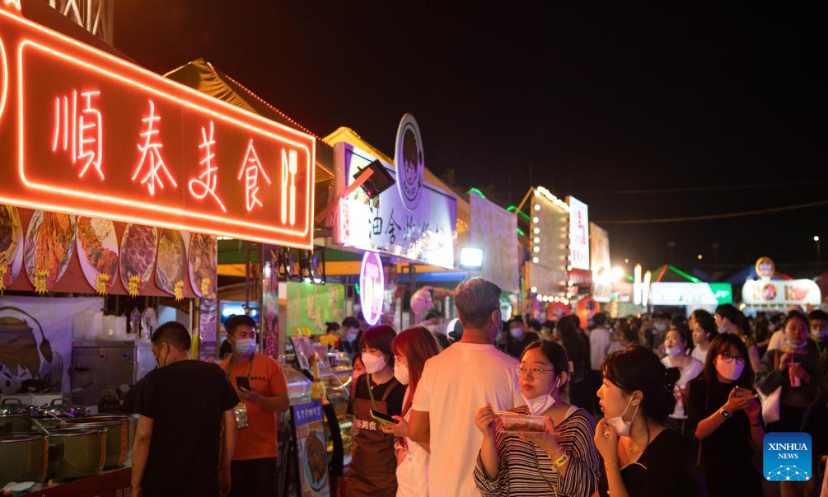 Visitors are seen during the 22nd Macao Food Festival at Sai Van Lake Square in Macao, south China, Nov 18, 2022. The 22nd Macao Food Festival kicked off on Friday. Photo:Xinhua