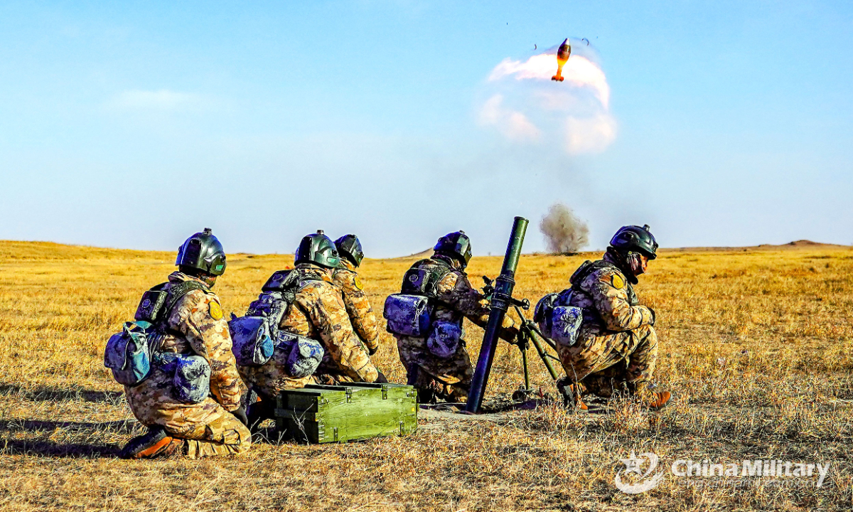 Soldiers assigned to a fireteam of an airborne brigade fire a mortar at simulated target during a recent combat training exercise to hone the troops' combat capabilities. Photo:China Military