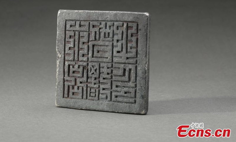 A silver seal of the Ming Dynasty (1368-1644) unearthed from the Jiangkou Battlefield of the Minjiang River in Pengshan County, southwest China's Sichuan Province, is on display, Nov. 16, 2022. Photo: Xinhua