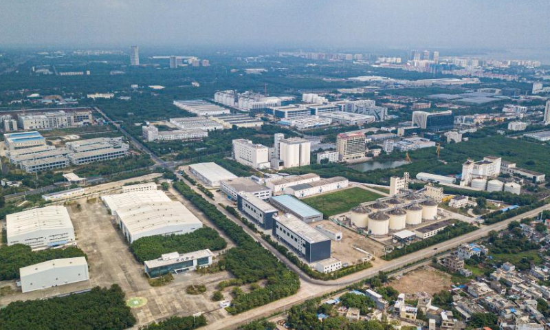 This aerial photo taken on Dec. 10, 2022 shows a view of the Yangpu bonded harbor under the Yangpu Economic Development Zone, south China's Hainan Province. According to Haikou Customs statistics, in the first 11 months of 2022, the total import and export value of Hainan's goods trade was 182.63 billion yuan (about 26.25 billion U.S. dollars), an increase of 40.1% year-on-year. (Xinhua/Pu Xiaoxu)