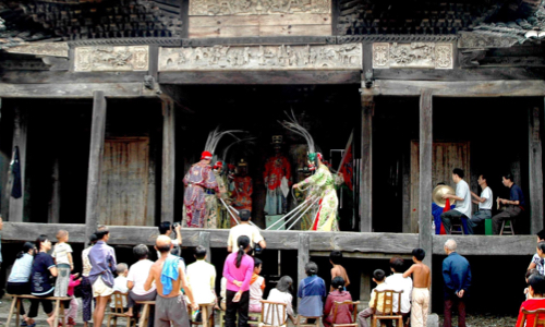 People watch a performance in East China’s Jiangxi Province. File photo: IC