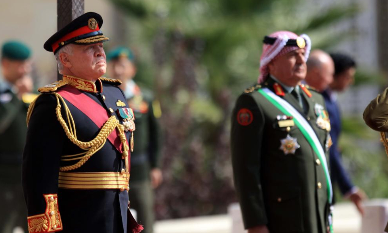 King Abdullah II of Jordan (L) reviews the honor guards upon his arrival at the Parliament for the second ordinary session of Jordan's 19th parliament in Amman, Jordan, Nov. 13, 2022. King Abdullah II of Jordan on Sunday pledged continued support for the Palestinians, calling the Palestinian cause a top priority of his kingdom. Photo: Xinhua