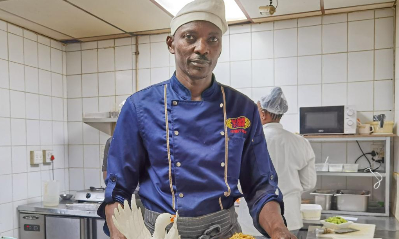 Chef Tuhafeni Sem displays a Chinese dish at a restaurant in Windhoek, Namibia, on Nov. 12, 2022. Photo: Xinhua