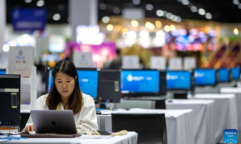 A staff member works at the media center of APEC 2022 in Bangkok, Thailand, Nov. 14, 2022. The 29th Asia-Pacific Economic Cooperation (APEC) Economic Leaders' Meeting will be held in Bangkok, Thailand, on Nov. 18-19. Photo: Xinhua