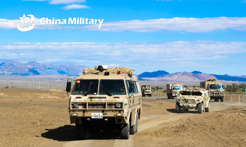 Military vehicles attached to a PLA border defense regiment move in line during a long-distance maneuver in a comprehensive exercise held on September 26, 2022. Photo: eng.chinamil.com.cn