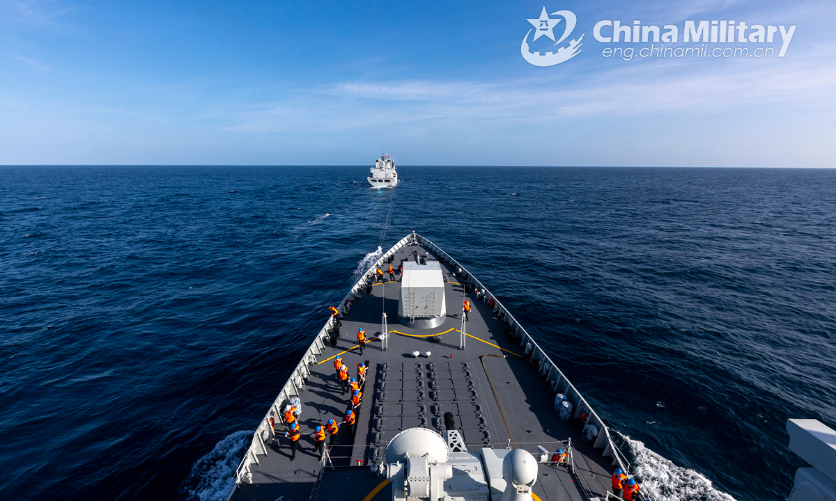 Two warships attached to the 42nd naval escort taskforce of the Chinese People's Liberation Army (PLA) conduct astern replenishment-at-sea in the waters of the Gulf of Aden on October 10, 2022. (eng.chinamil.com.cn/Photo by Wang Qing)