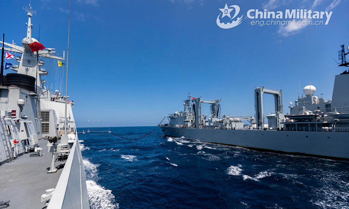 Two warships attached to the 42nd naval escort taskforce of the Chinese People's Liberation Army (PLA) conduct underway replenishment-at-sea in the waters of the Gulf of Aden on October 10, 2022. (eng.chinamil.com.cn/Photo by Wang Qing)