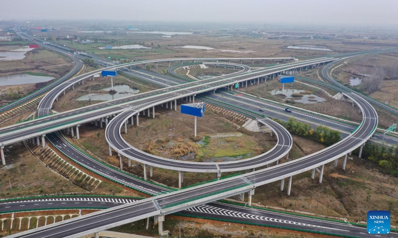 This aerial photo taken on Nov. 27, 2022 shows Fushan interchange of an expressway linking Lai'an County and Tianchang City of Chuzhou, east China's Anhui Province. The 67.135-kilometer-long expressway has passed acceptance check. (Photo by Liu Yucai/Xinhua)