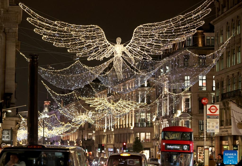 Vehicles run on Oxford Street decorated with Christmas lights in central London, Britain, on Nov. 29, 2022. (Xinhua/Li Ying)