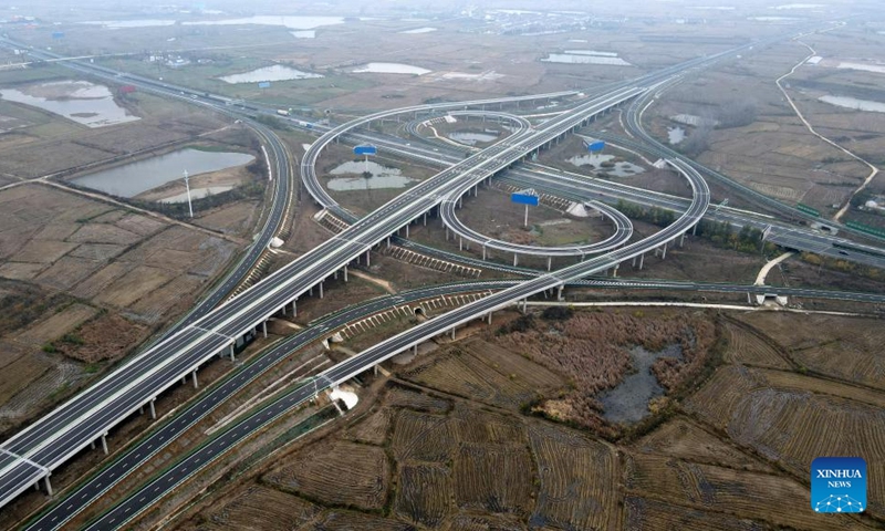 This aerial photo taken on Nov. 27, 2022 shows Fushan interchange of an expressway linking Lai'an County and Tianchang City of Chuzhou, east China's Anhui Province. The 67.135-kilometer-long expressway has passed acceptance check. (Xinhua/Liu Junxi)