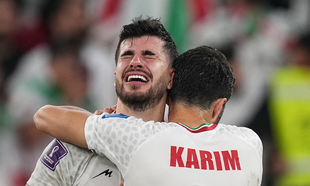 Iran's Saeid Ezatolahi cries after their World Cup Group B loss to the US in Doha, Qatar, on November 29, 2022. Photo: VCG

