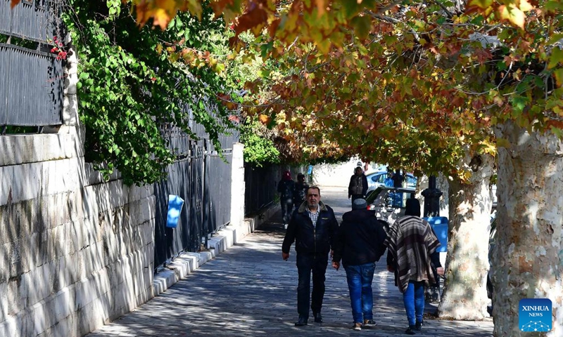 People walk down the street in Damascus, capital of Syria, Nov. 30, 2022.(Photo: Xinhua)