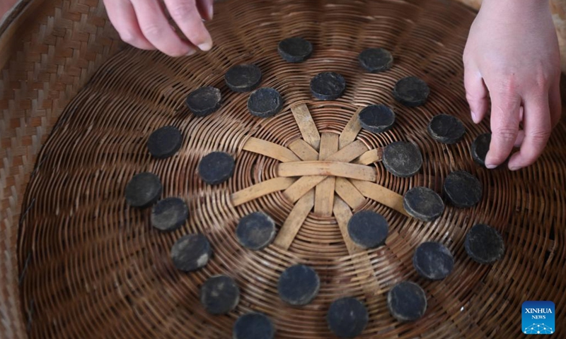 This photo taken on Nov. 30, 2022 shows some Zisun tea cakes in Changxing County, east China's Zhejiang Province. Zisun tea, produced in the county, has a history of more than 1,000 years. It was designated as the tribute tea in the Tang Dynasty (618-907).(Photo: Xinhua)